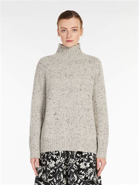 Wool and cashmere sweater with Web in ivory 